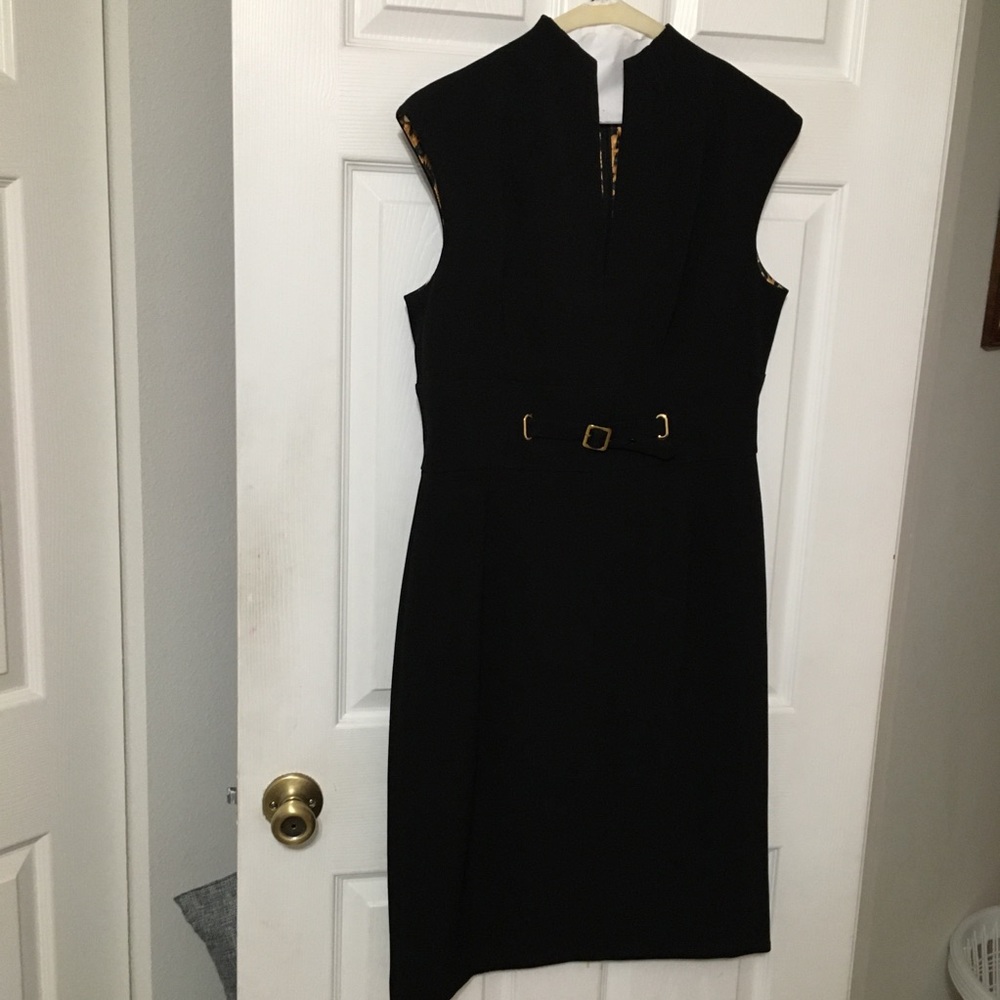 Sleeveless black crepe dress